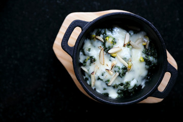 Spinach Cheese Bake on wooden plate apptizer
