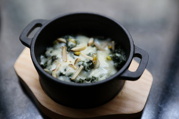 Spinach Cheese Bake on wooden plate apptizer