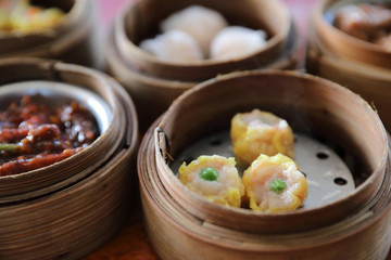 Dim sum , Steam Dumpling in wood basket Chinese food