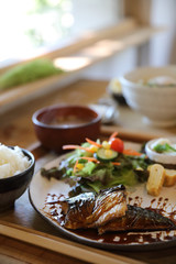 Saba fish teriyaki with rice soup and salad on wood background , Japanese food