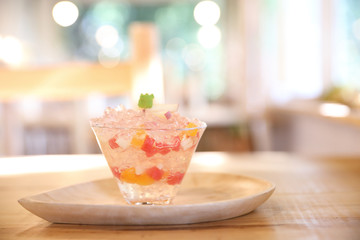 Japanese dessert jelly with fruit on wood plate