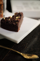 chocolate cake on wood background