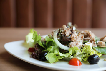 Tuna salad appetizer on wood background