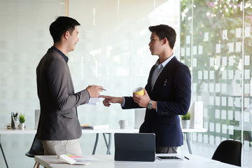 Business working in office with documents and laptop people Consulting and business planning.