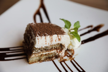 Tiramisu cake sweet dessert in close up
