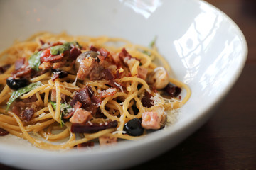 Dried Chili and Bacon Spaghetti on wood background