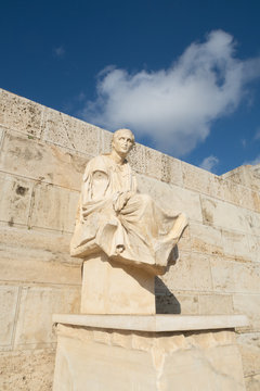 Athens, Greece - Dec 20, 2019: Sculpture of Menander (Meandros) of the Theatre of Dionysus Eleuthereus at Acropolis of Athens. Attica region, Greece.