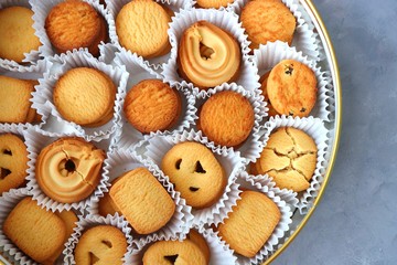An overhead or flat lay view of Danish butter cookies in the traditional tin box. valentines day gift. with copy space