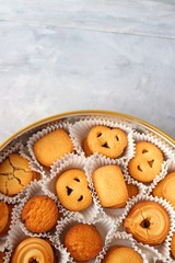 An overhead or flat lay view of Danish butter cookies in the traditional tin box. valentines day gift. with copy space