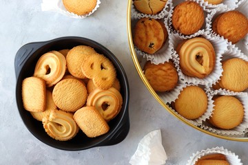 An overhead or flat lay view of Danish butter cookies in the traditional tin box. valentines day gift. with copy space