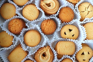 An overhead or flat lay view of Danish butter cookies in the traditional tin box. valentines day gift. with copy space