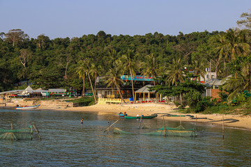 Fototapeta na wymiar Beautiful and idyllic beach in southeast Asia. Bãi biển Gành Dầu beach with boats in north Phu Quoc, Vietnam. 