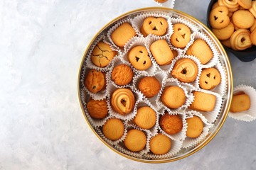 An overhead or flat lay view of Danish butter cookies in the traditional tin box. valentines day...