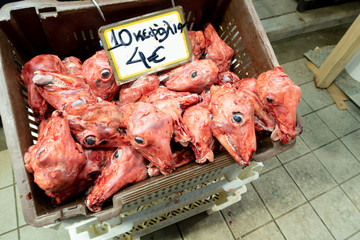 Athens, Greece - Dec 21, 2019: lamb heads in  butcher's meat stall in Central Market, the public market of Athens, Dimotiki agora, also known as Central Athens Public Market.