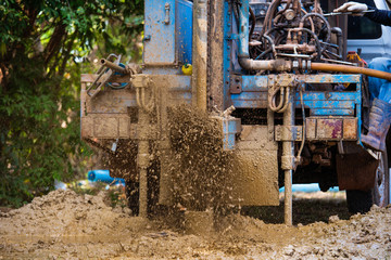 Fototapeta premium ground drilling water machine on old truck drilling in the ground for water