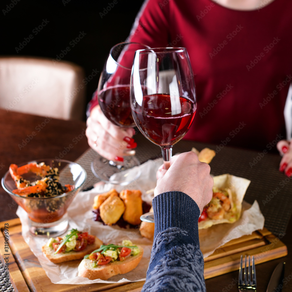 Wall mural couple in a restaurant romantic dinner