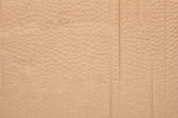 Brown cardboard sheet abstract background.