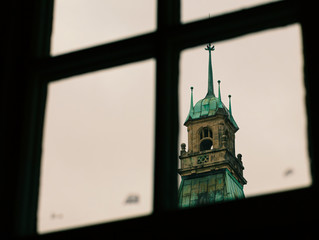 Ancient church bell tower with a clock
