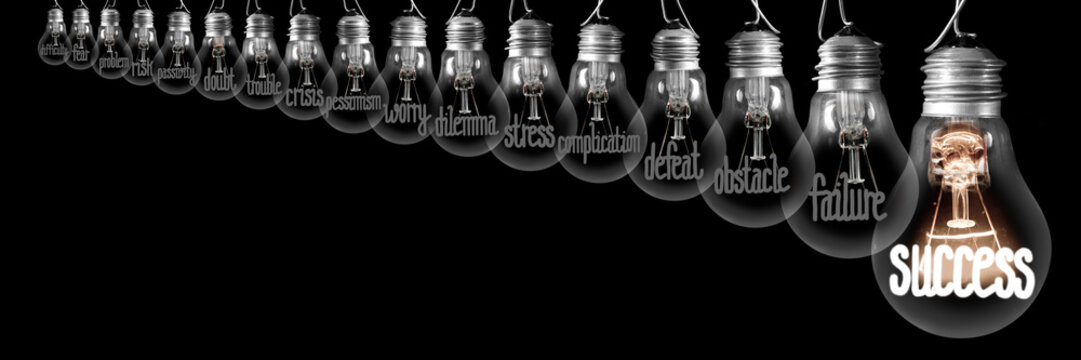 Light Bulbs with Difficulties and Success Concept
