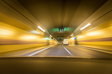 Cars Moving On Road In Tunnel