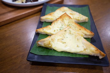 Cheese Garlic Bread Cut into pieces, place in a plate