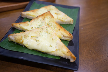 Cheese Garlic Bread Cut into pieces, place in a plate