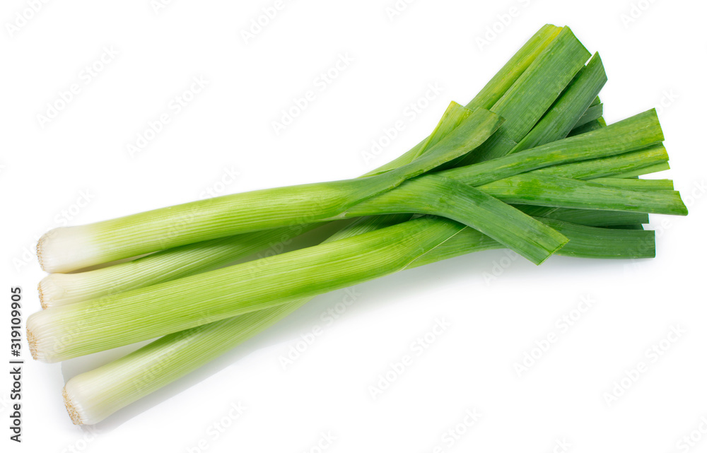 Wall mural Fresh leek on white background