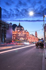 Melbourne, Victoria / Australia - January 26 2020: Flinders Street Station and church with light...