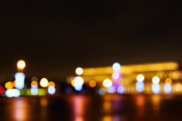 Street city lights out of focus at night, bokeh