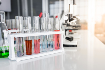 Science laboratory test tubes. Laboratory glassware containing chemical liquid