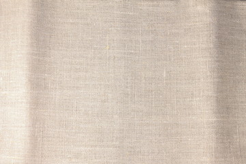 Fototapeta premium Beige linen fabric cotton for wallpaper design.