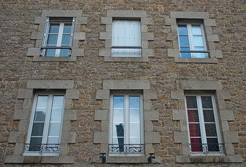 Fototapeta premium Traditional french stone building with many windows