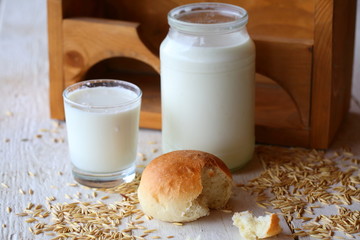 Bread with milk on a wooden table