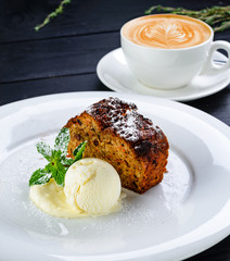 dessert chocolate cake and ice cream with cappuccino coffee