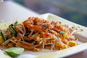 pad Thai noodles with shrimp and bean sprout, isolated from background 