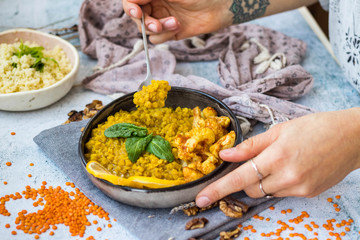 Obraz na płótnie Canvas Lentil masala red dal cooked with cauliflower vegetables. Vegan Indian healthy food 