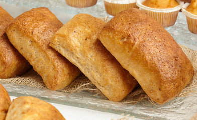 Вuns from wholemeal flour, .laid out on burlap.