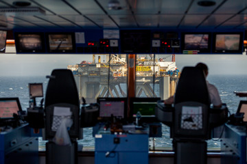 Anchor handler vessel Siem Amethyst bridge view at oil rig Transocean Prospect  during an offshore...