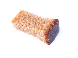 pieces of dried bread on a white background