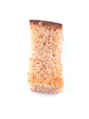 pieces of dried bread on a white background
