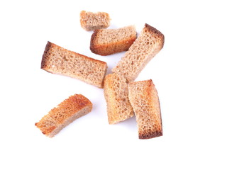 pieces of dried bread on a white background