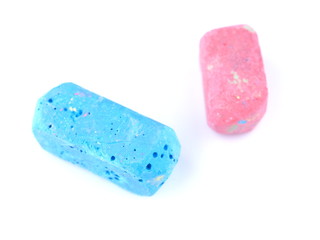 colored chalks on a white background