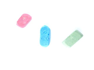 colored chalks on a white background