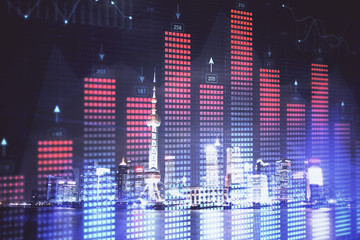Financial graph on night city scape with tall buildings background multi exposure. Analysis concept.