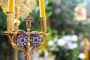  candlestick in the church The candlestick is decorated with candles used by priests in the...