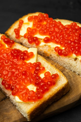 sandwich with butter and red caviar