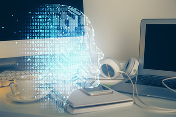 Double exposure of table with computer and brain hologram. Data innovation concept.