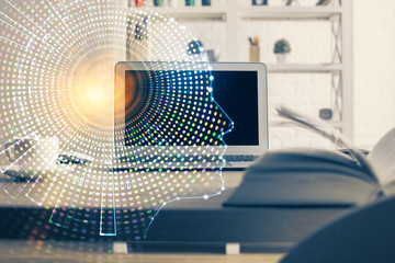 Double exposure of table with computer and brain hologram. Data innovation concept.