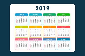 Calendar of 2019 is depicted on a dark blue background. Each month is highlighted in a separate color.