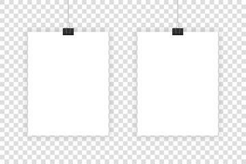 Two white realistic sheets hang on paper clips on a transparent background.
